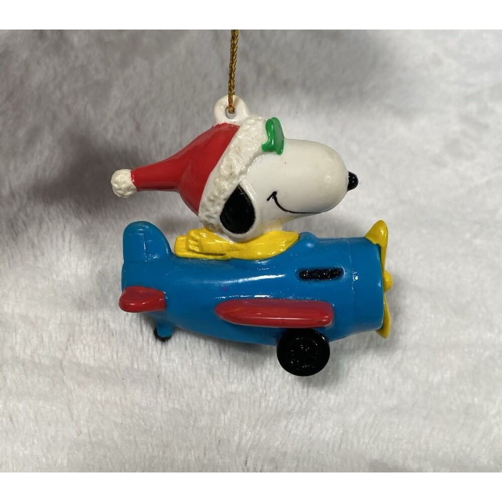 Vintage United Feature Peanuts Snoopy Blue Airplane Christmas Ornament PVC
